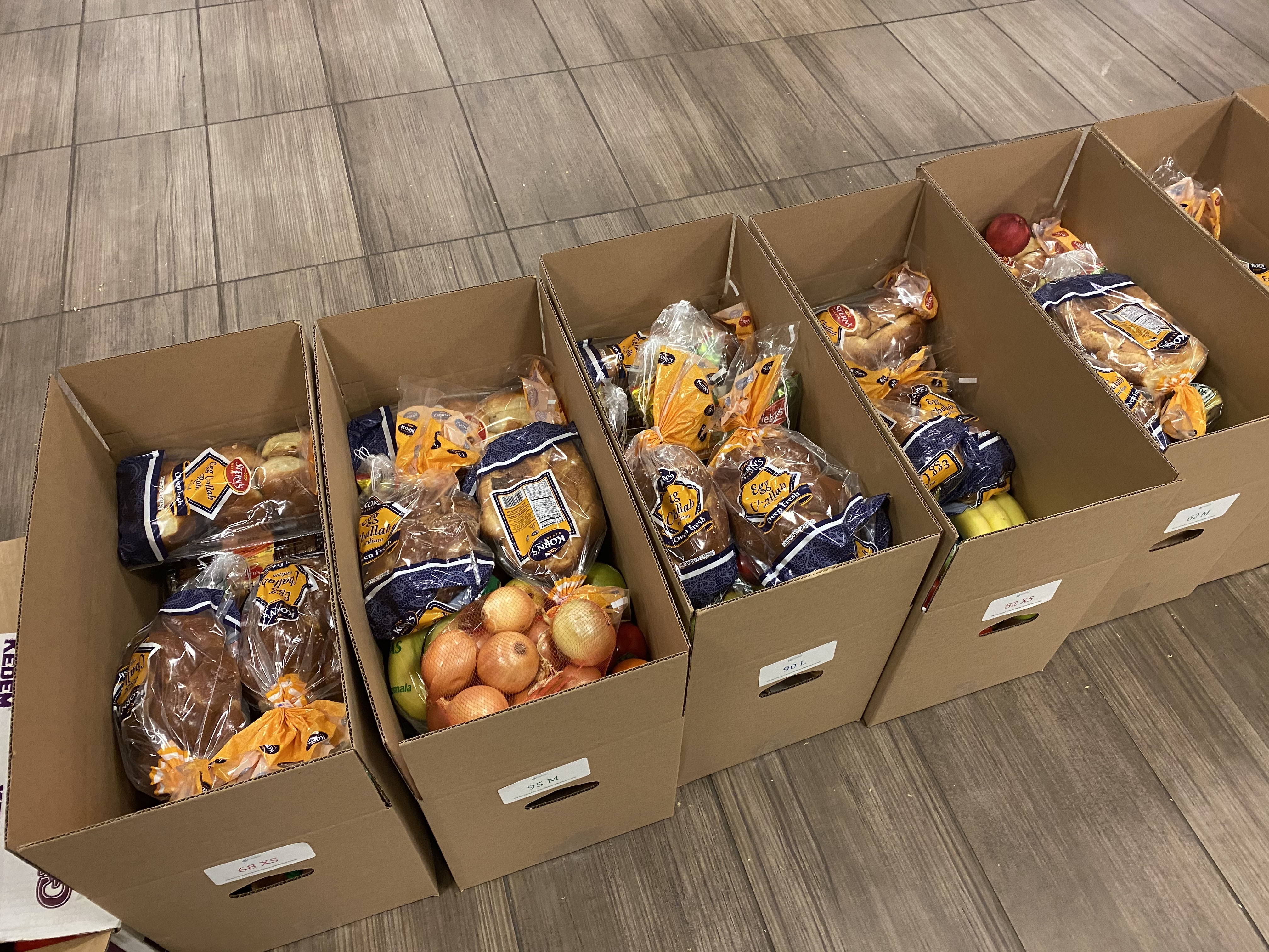 Filled Shabbos boxes ready for delivery