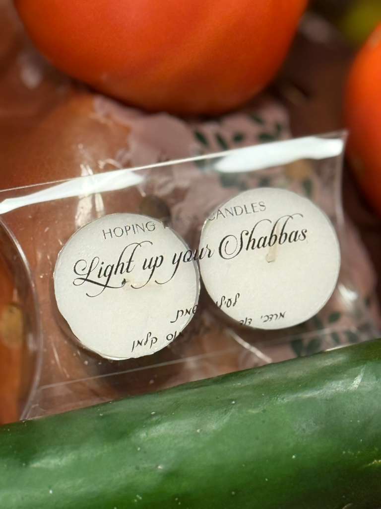 Shabbos candles included in every Tomchei Shabbos box