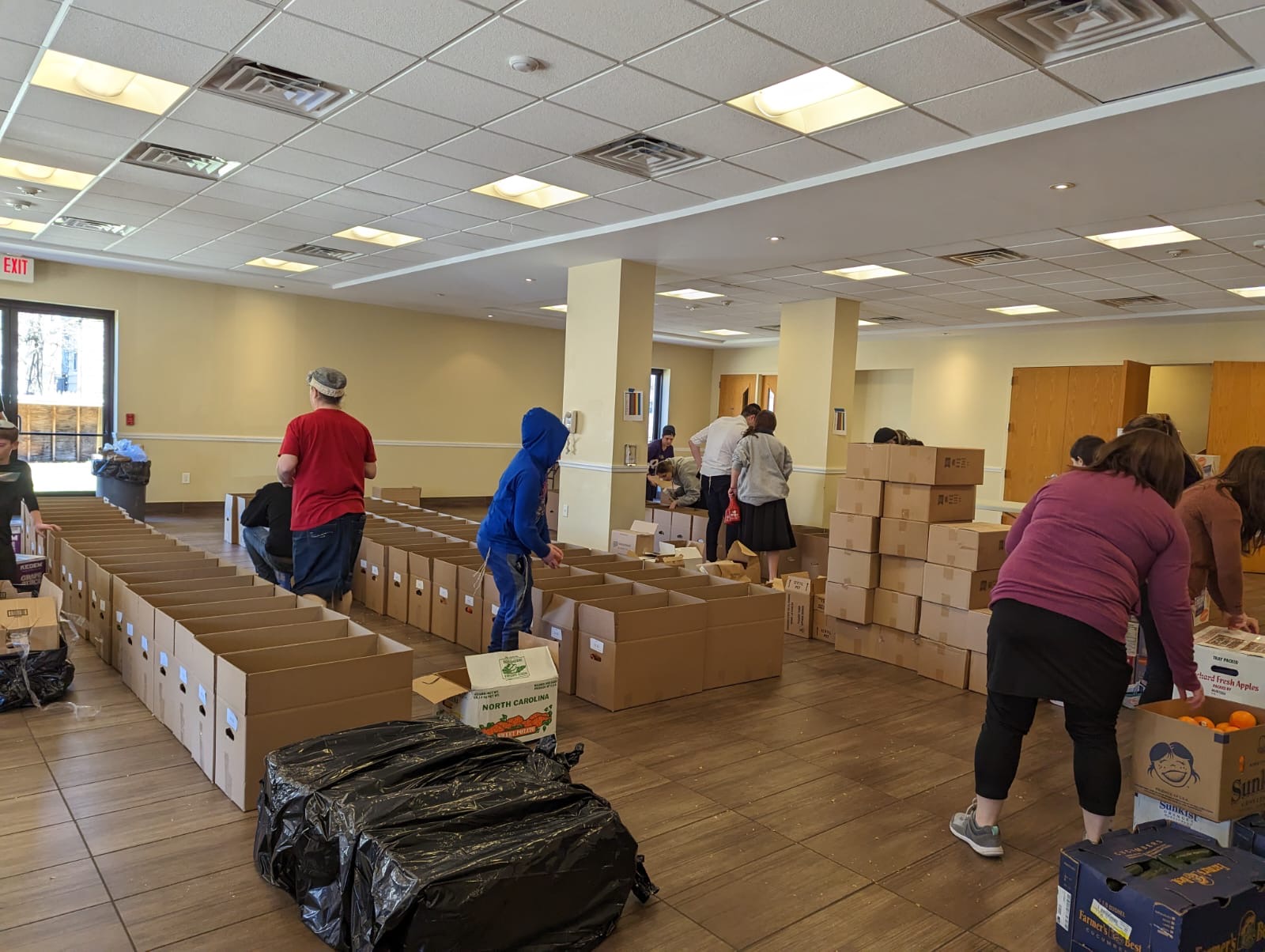 Volunteers packing Shabbos boxes at Congregation Ahavas Achim